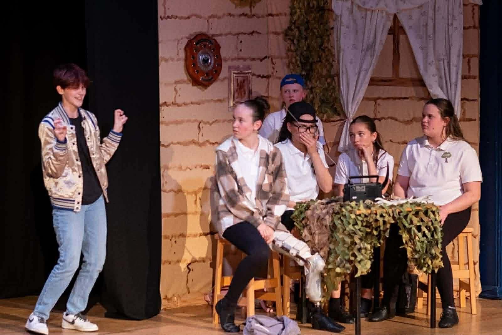 Children on a stage acting