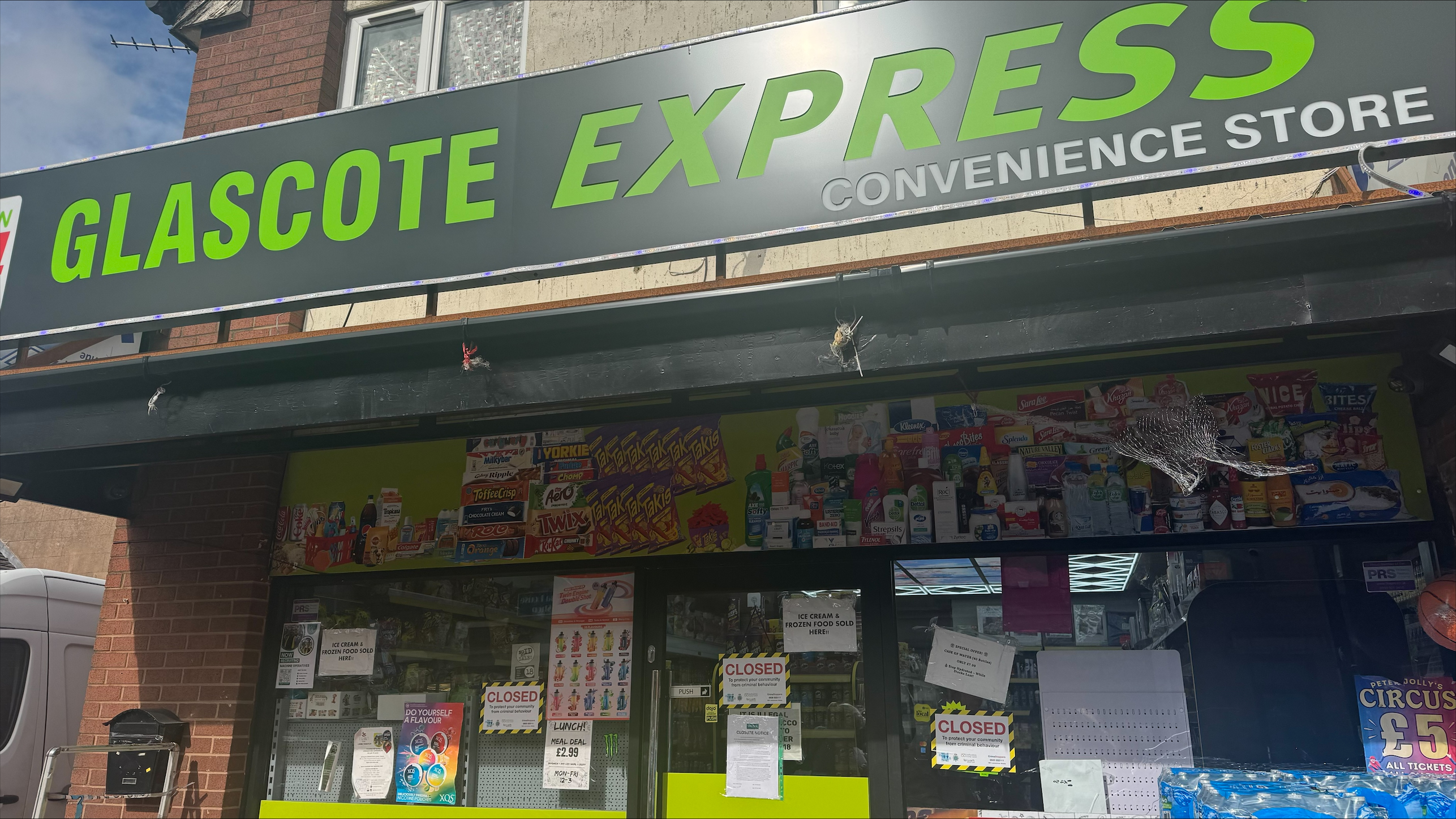 The front of a shop in Tamworth called 'Glascote Express' with closure notices on the windows