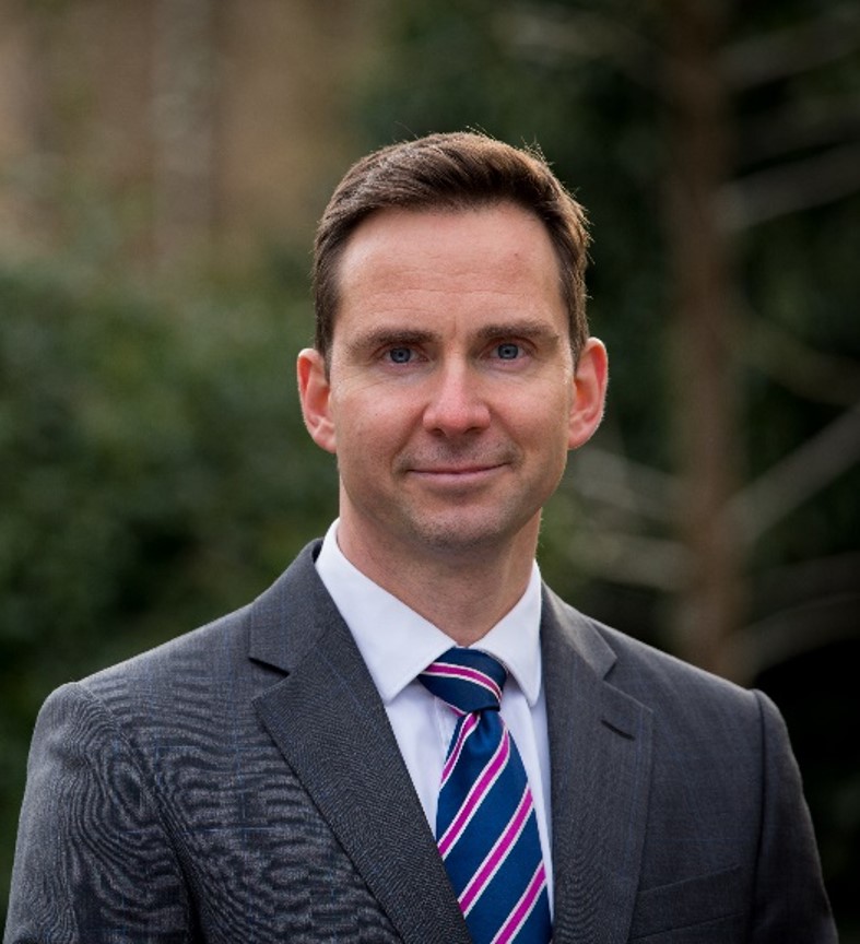 image of male wearing a tie and jacket