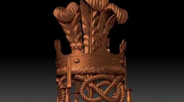image of the proposed monument. It is bronze with rope notes on the bottom, a crown and feathers on the top.